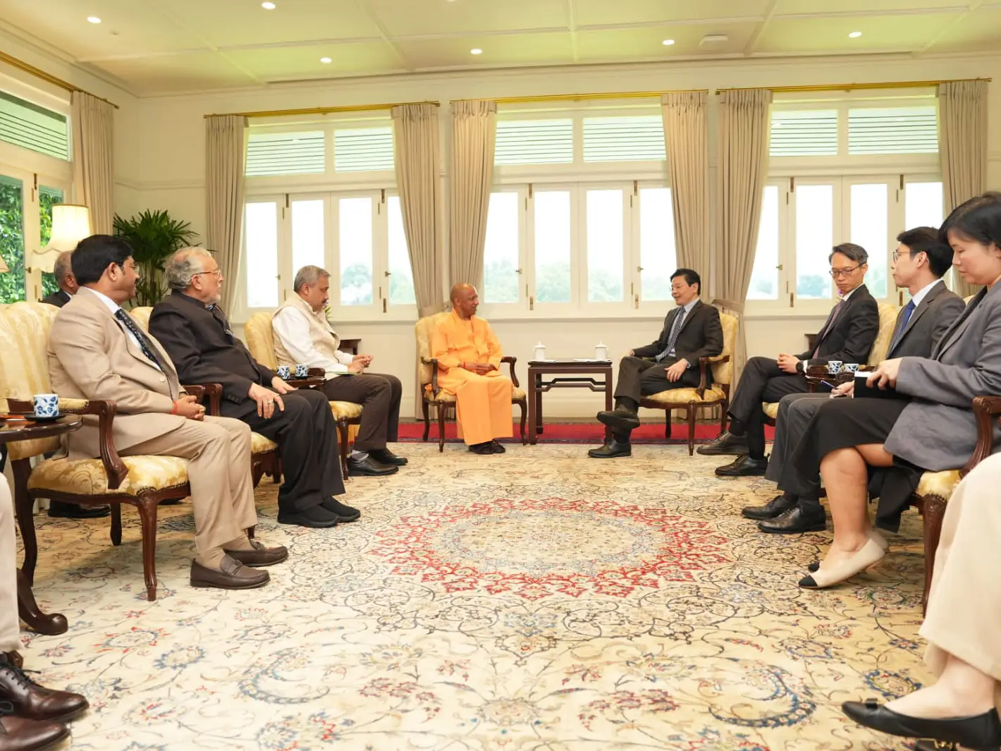 'A saffron-clad businessman': Yogi Adityanath, wearing traditional dress, meets Singapore investors 'A saffron-clad businessman': Yogi Adityanath, wearing traditional dress, meets Singapore investors