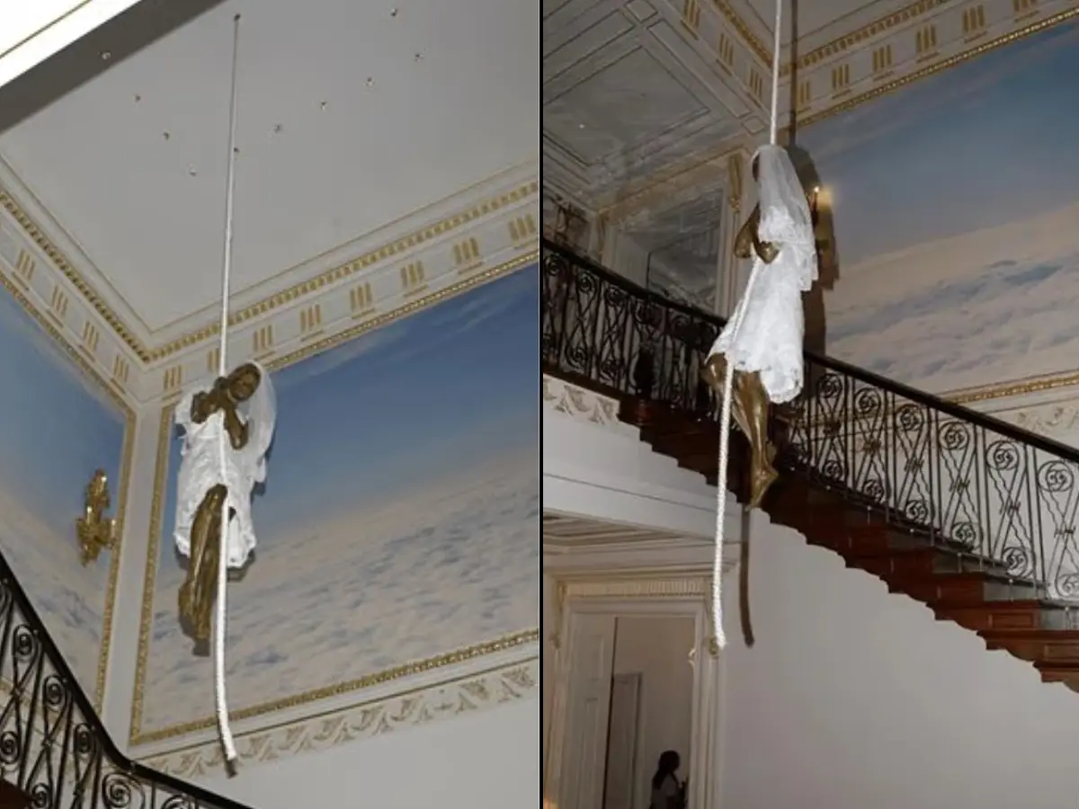 Bride statue hanging from a rope inside Epstein's mansion