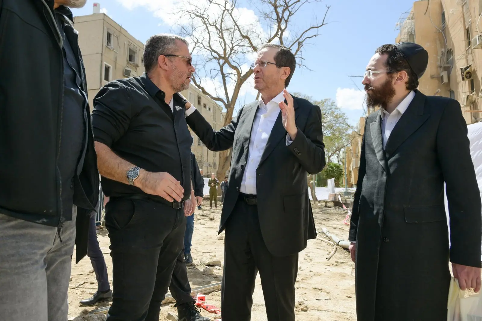 President Herzog inspects damage