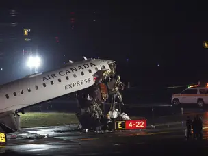 LaGuardia airport plane crash: Air Canada flight collides with fire truck, two pilots killed, dozens injured in runway disaster. What we know so far