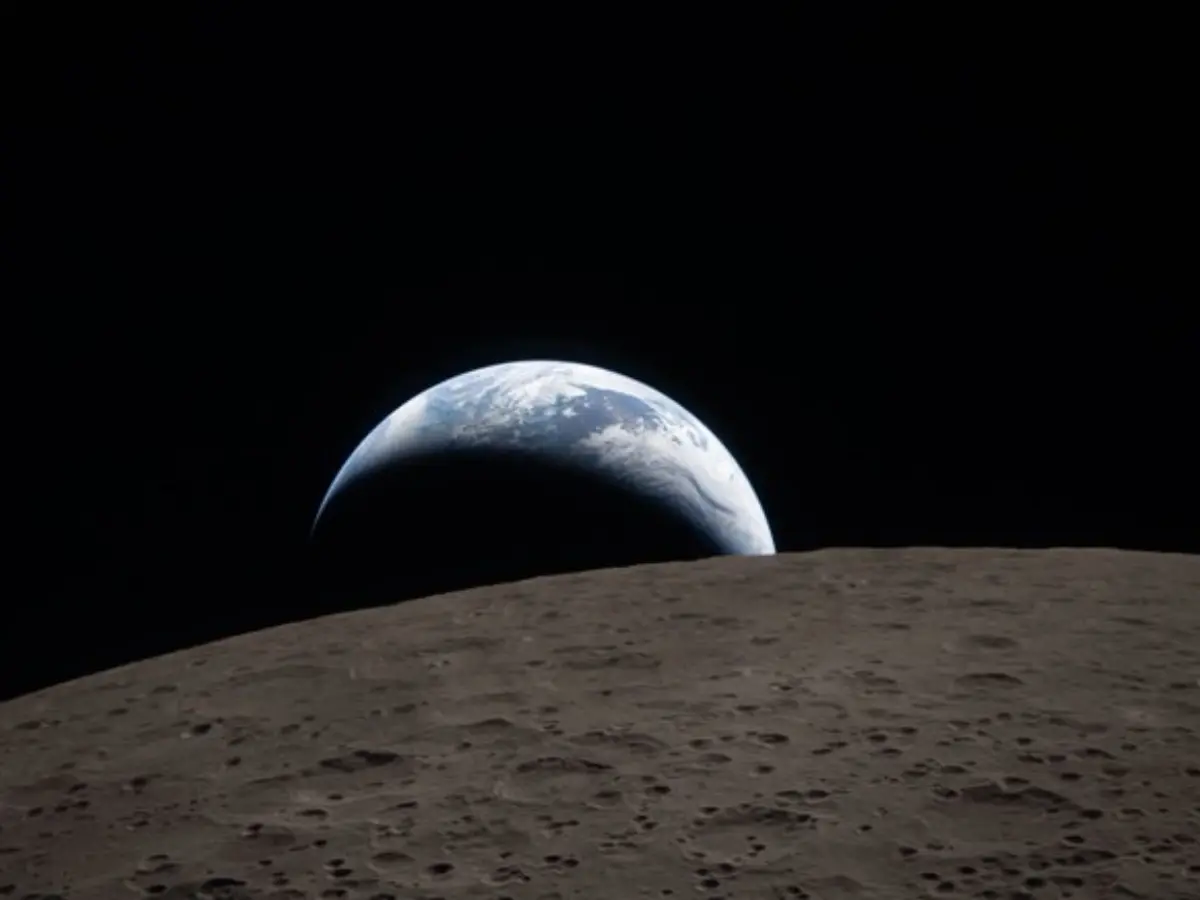 Earthrise, the first photo from the far side of the Moon