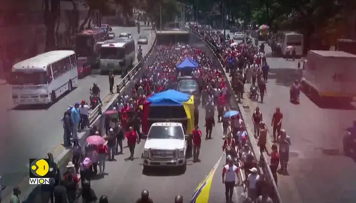 Venezuela Protests: Caracas Boils Over As Workers Clash With Police Over Frozen Wages