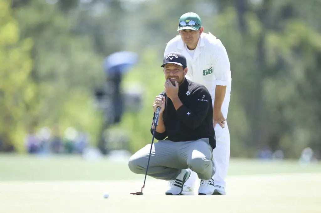 Augusta Masters Shot of the Day | WATCH - Xander Schauffele lands ball in shopping bag on eighth hole
