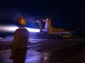 How does USS Abraham Lincoln’s flight deck crew communicate without words in high-risk operations?