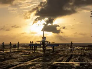 Why USS Abraham Lincoln is known as a billion-piece war machine with 4 core tasks. What are they?