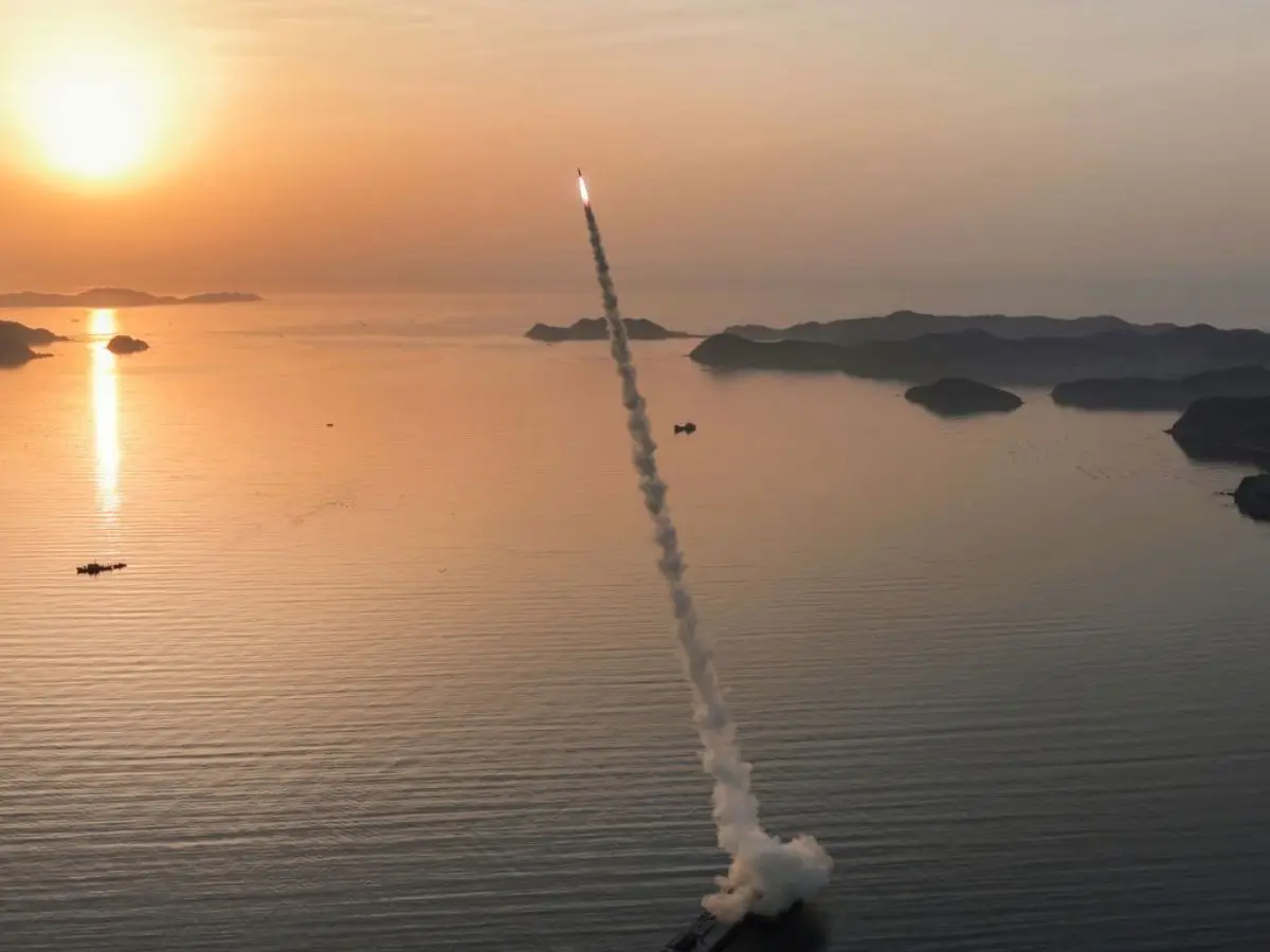 North Korea’s Kim Jong Un oversees ballistic missile test-fires with cluster munitions – PICS