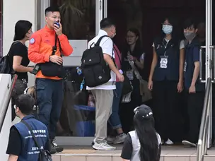 Deadly Hong Kong fire survivors return to charred homes, officials say rebuilding 'not feasible'
