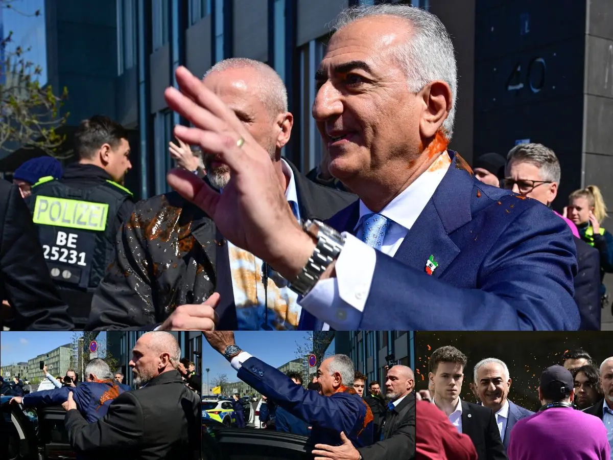 Iran’s exiled Crown Prince Reza Pahlavi splashed with red liquid after Berlin press conference