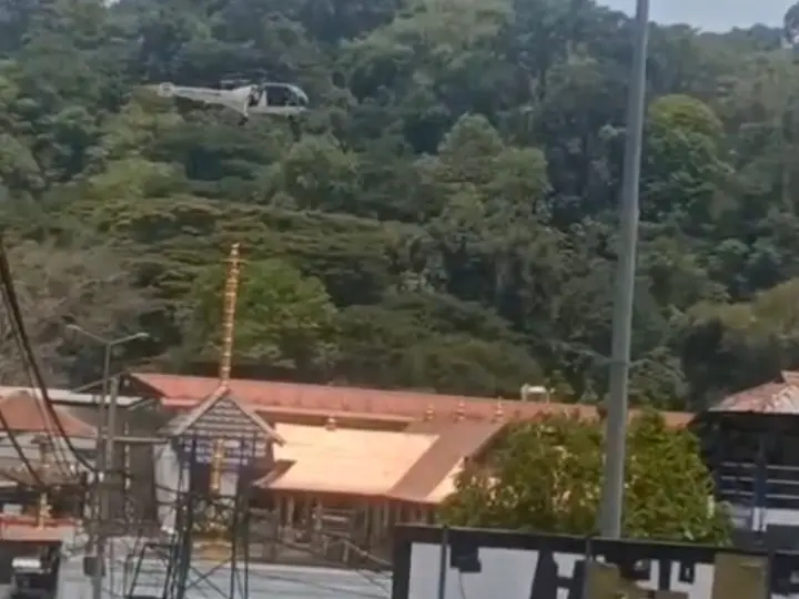 India: Coast Guard helicopter flies meters above Sabarimala temple; ICG blames weather India: Coast Guard helicopter flies meters above Sabarimala temple; ICG blames weather