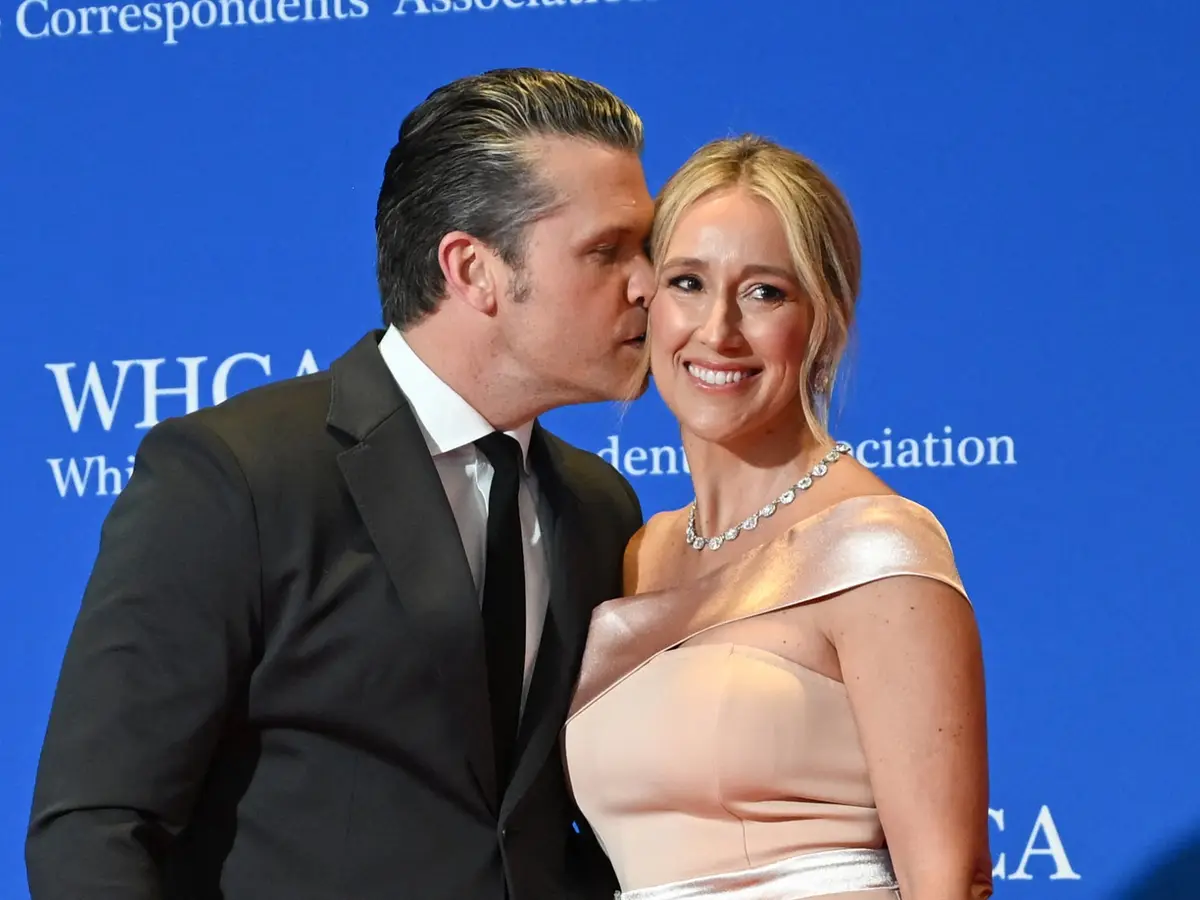 Pete Hegseth’s wife wears a $42 dress at WHCD - and sparks political debate online. Here’s why
