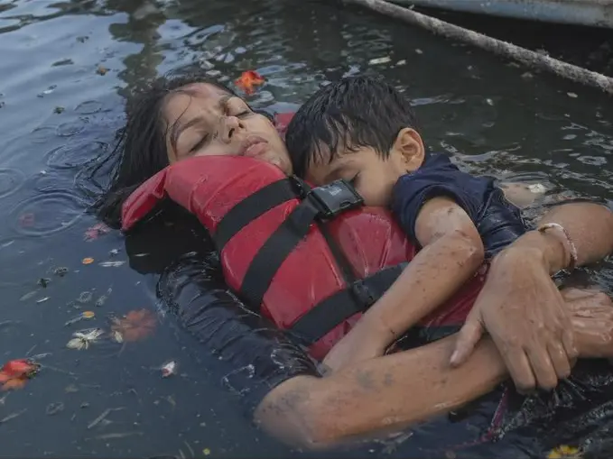 Bargi Dam cruise boat tragedy: Heartbreaking photo of mother and son clinging to each other fake? Jabalpur collector says...