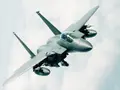 What is the range of the F-15IA fighter jet without refueling?