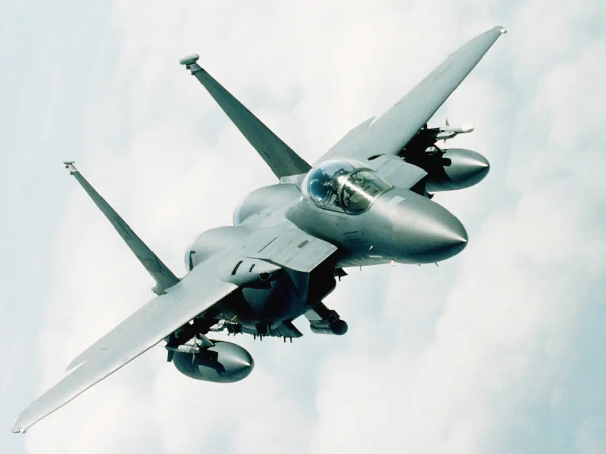 What is the range of the F-15IA fighter jet without refueling?