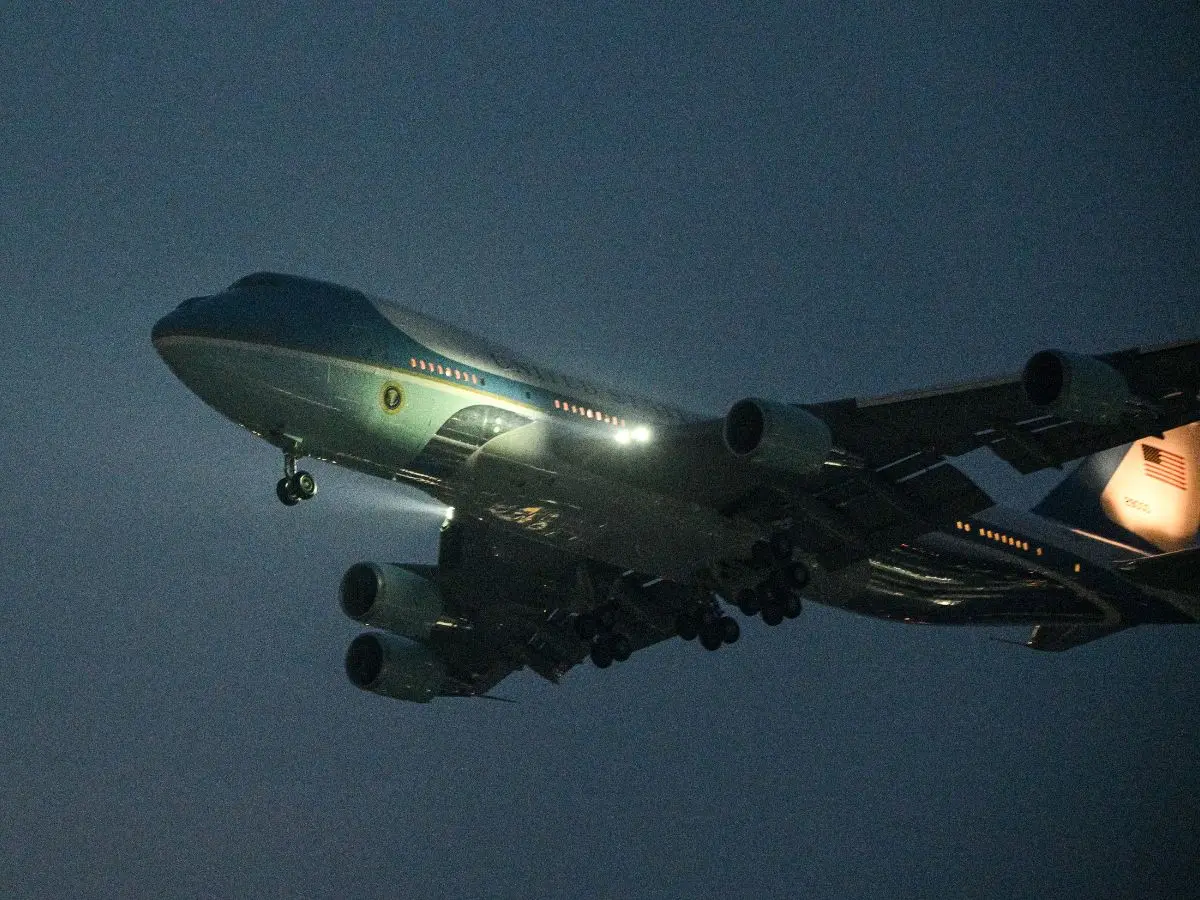 Trump lands in Beijing