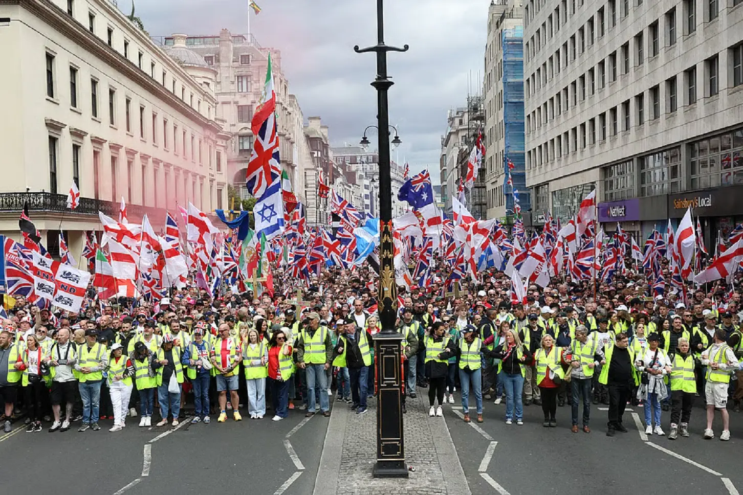 ‘Prepare for battle of Britain’: Tommy Robinson tells tens of thousands at London rally