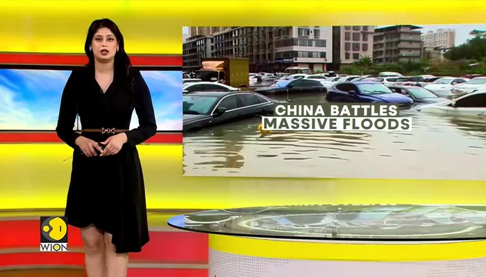 China Floods: Residents Wade Through Waterlogged Streets 