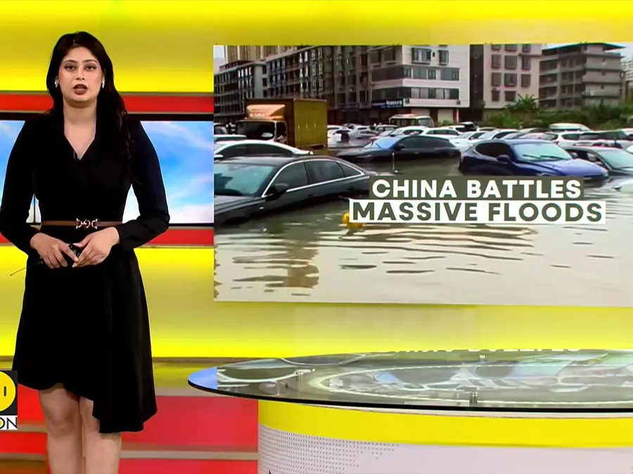China Floods: Residents Wade Through Waterlogged Streets 
