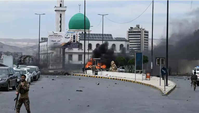 Syrian soldier killed, 18 wounded in Damascus car bomb explosion outside a defence ministry building