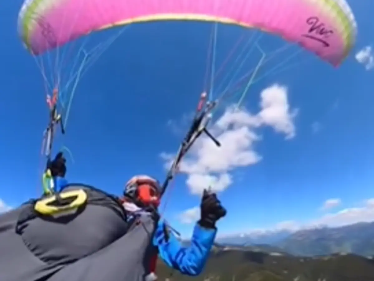 WATCH: Paraglider collides with aircraft mid-air, saves herself with emergency parachute