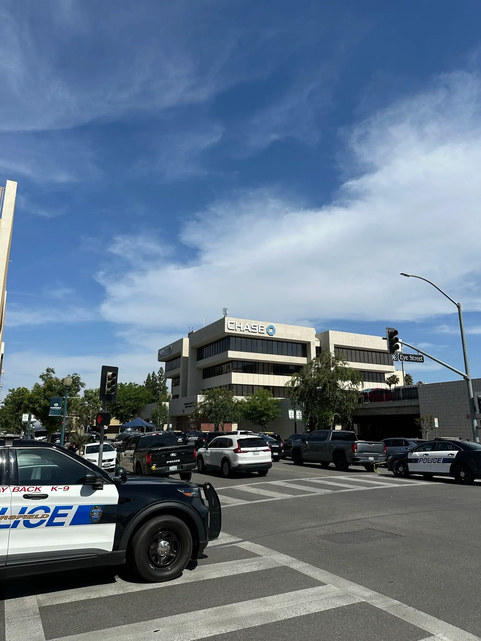 Bakersfield bank hostage situation: Major police response underway as man with bomb strapped to chest hijacks California bank