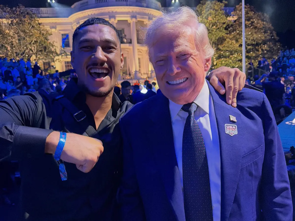 Boxer Jai Opetaia put his hand on Trump's shoulder, adding fuel to speculations about president's suit