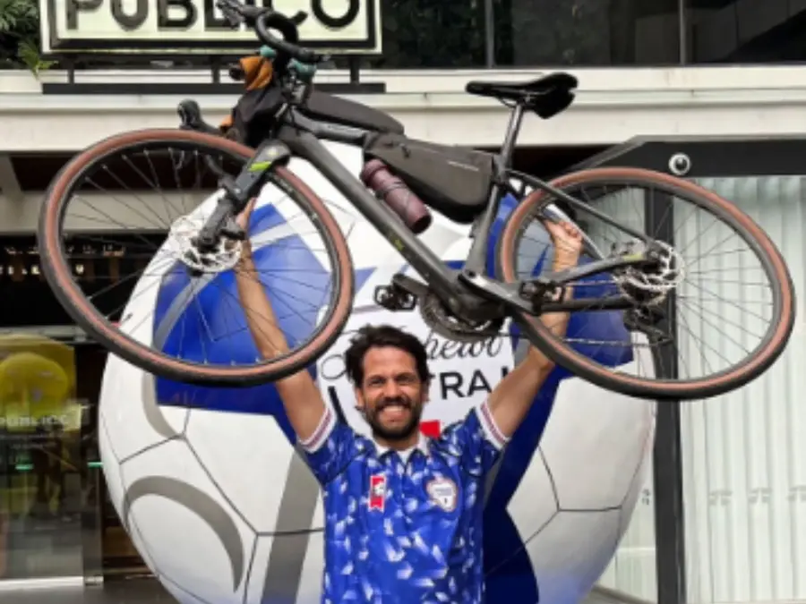 Ultimate Devotion: Colombian fan cycles over 4,000km across capitals to support team at World Cup