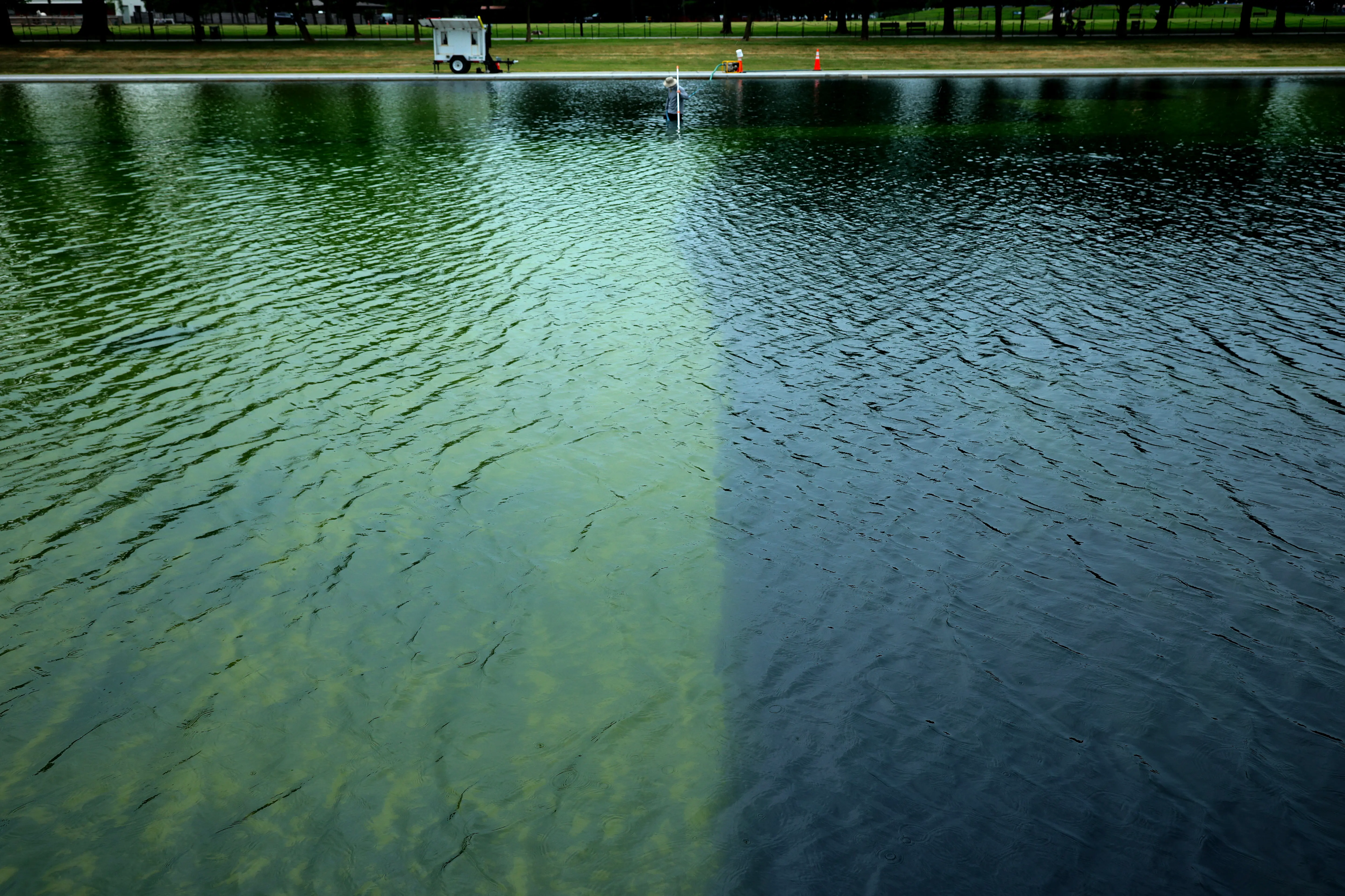 'Holy s**t!!': American flag blue turning puke green, huge chunks of paint peeling—Trump's reflecting pool is already falling apart | WATCH
