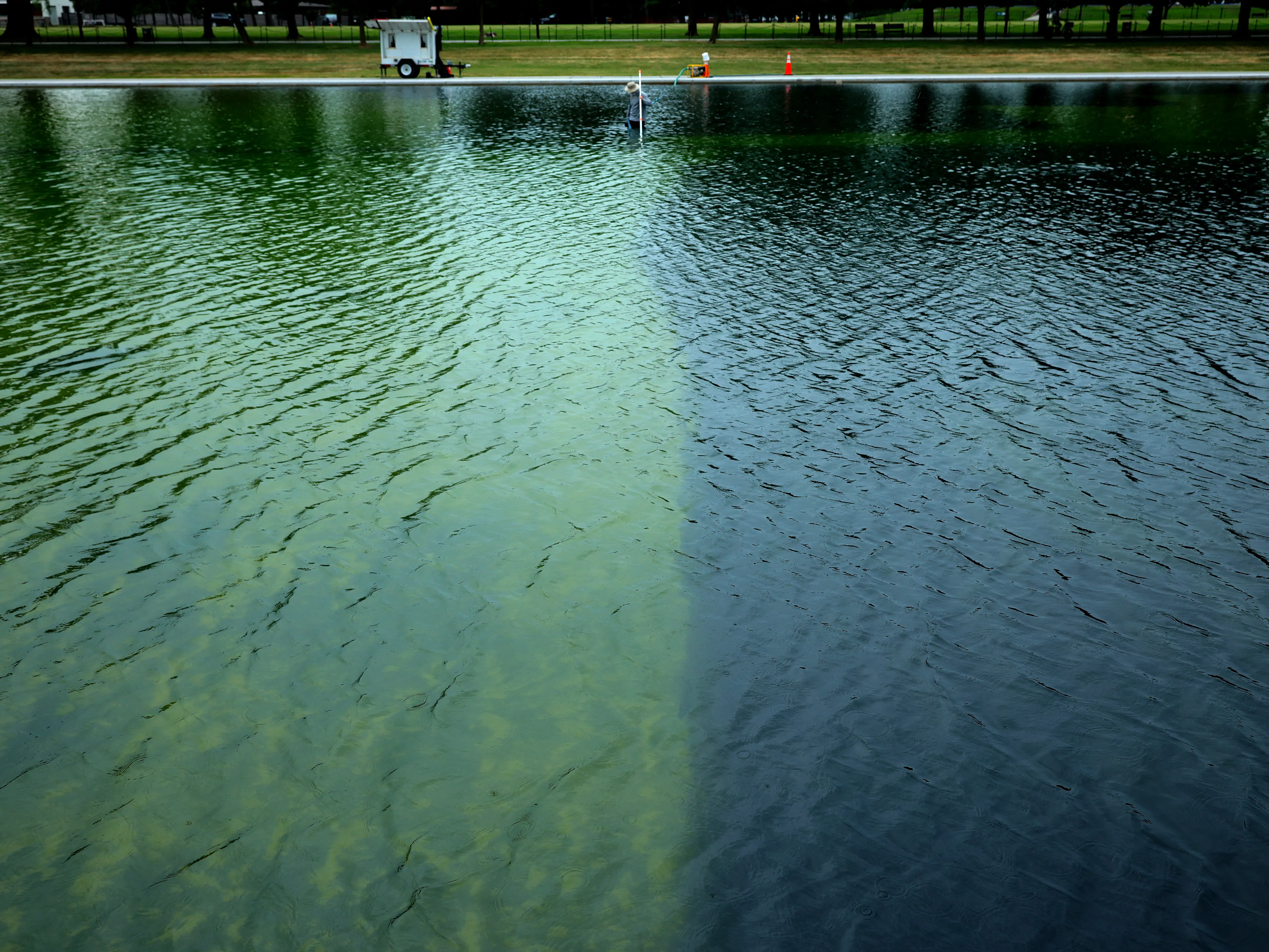 'Holy s**t!!': American flag blue turning puke green, huge chunks of paint peeling—Trump's reflecting pool is already falling apart | WATCH