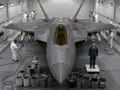 Why the paint on an F-22 weighs more than an adult man