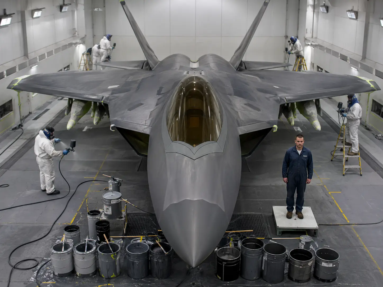 Why the paint on an F-22 weighs more than an adult man