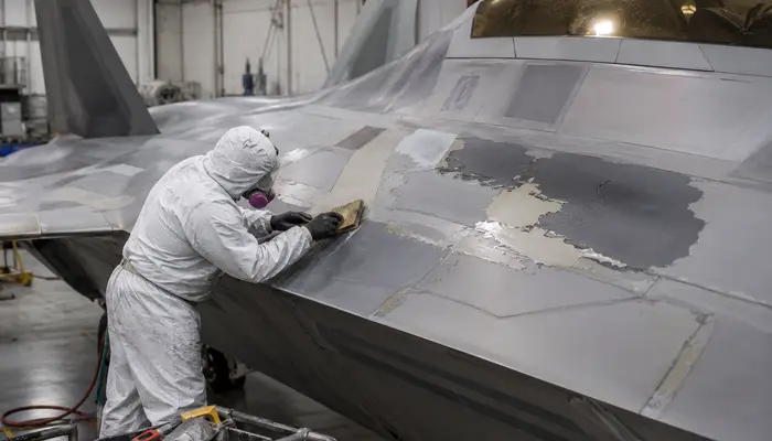 Why is the paint on the F-22 so difficult and expensive to maintain?