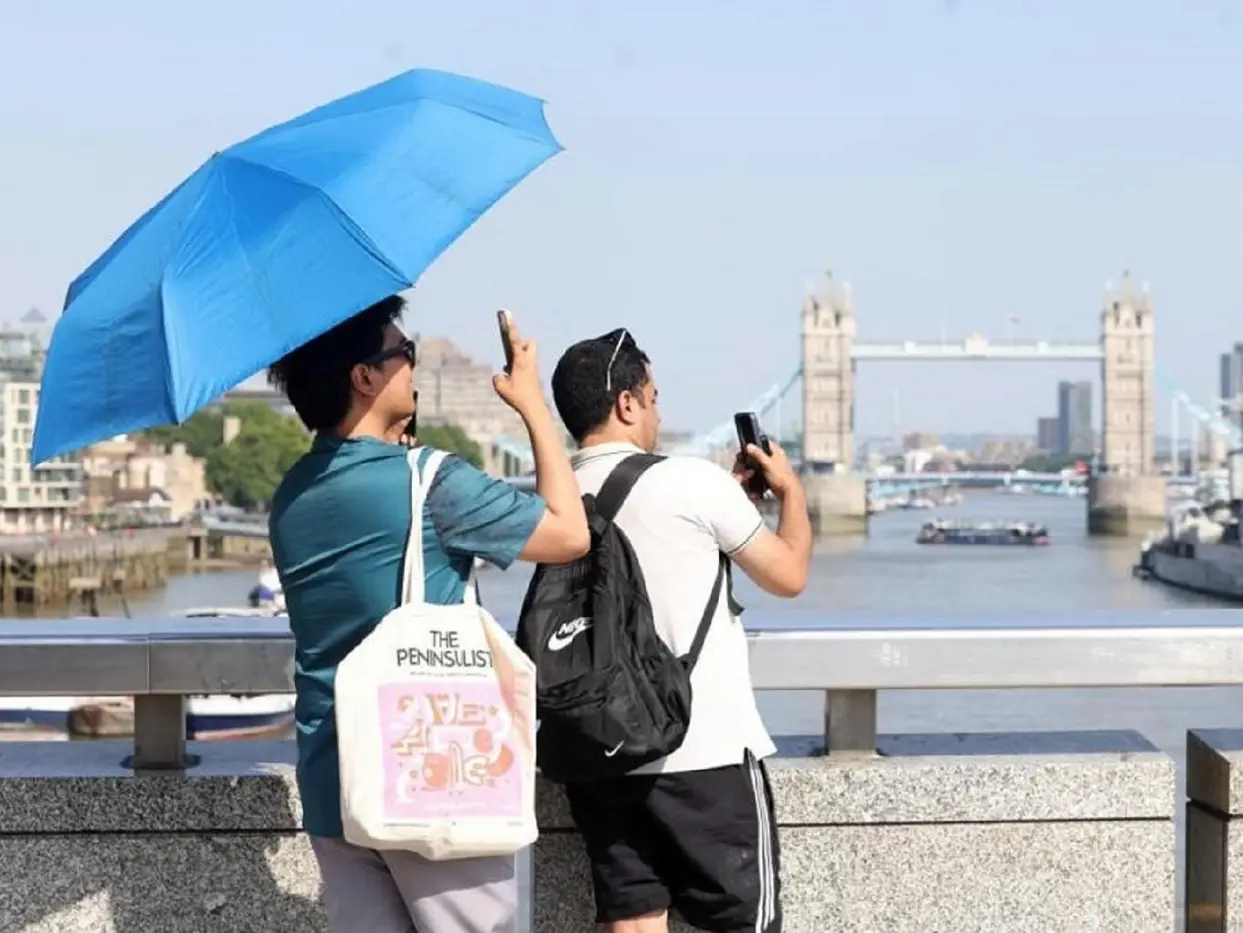 UK records its hottest June day, beating 1957 and 1976 highs; WHO warns of risk to lives