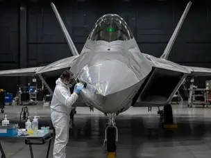 Why fixing a tiny scratch on the F-22 skin takes over 24 hours to cure