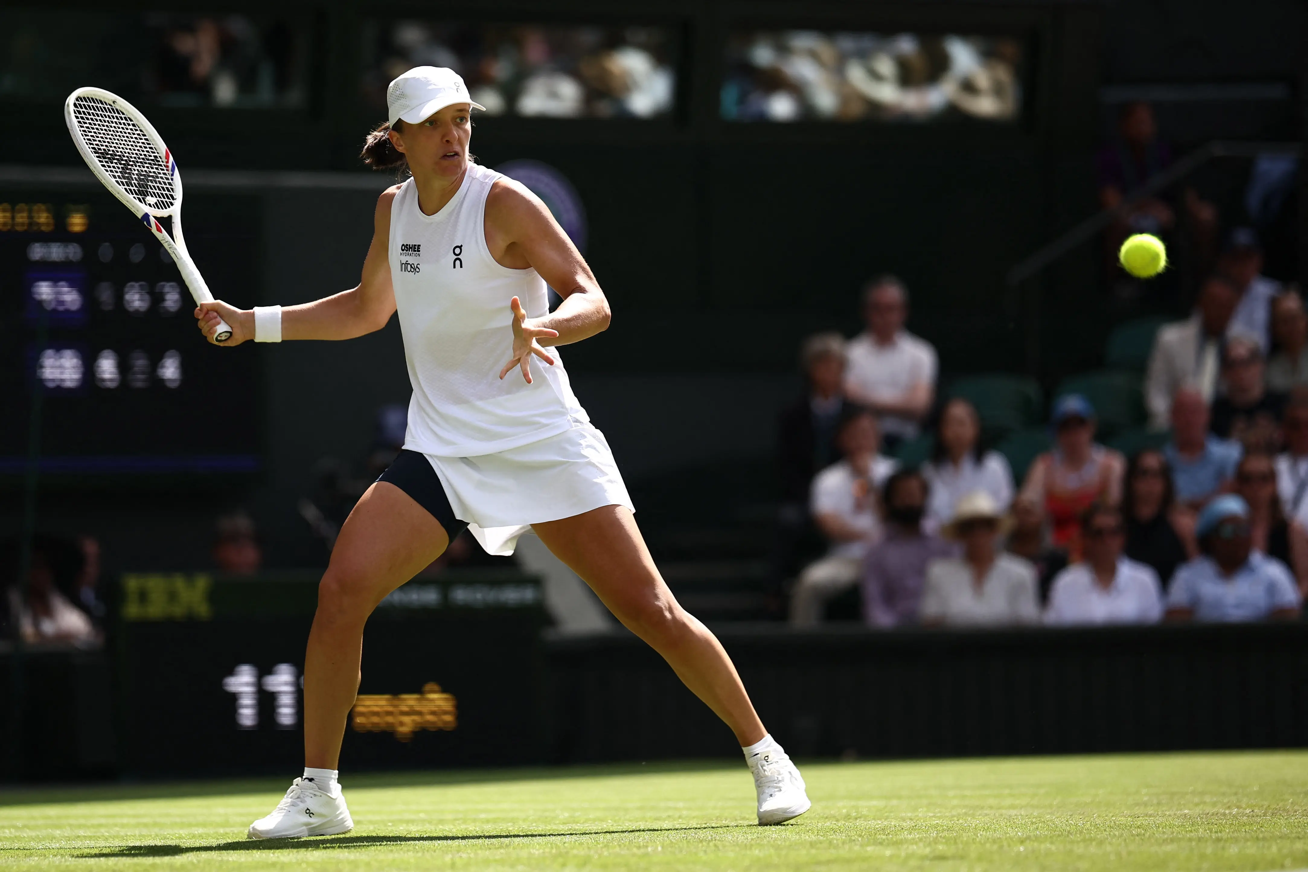Iga Swiatek survives first-round scare against Taylor Townsend to begin Wimbledon title defence