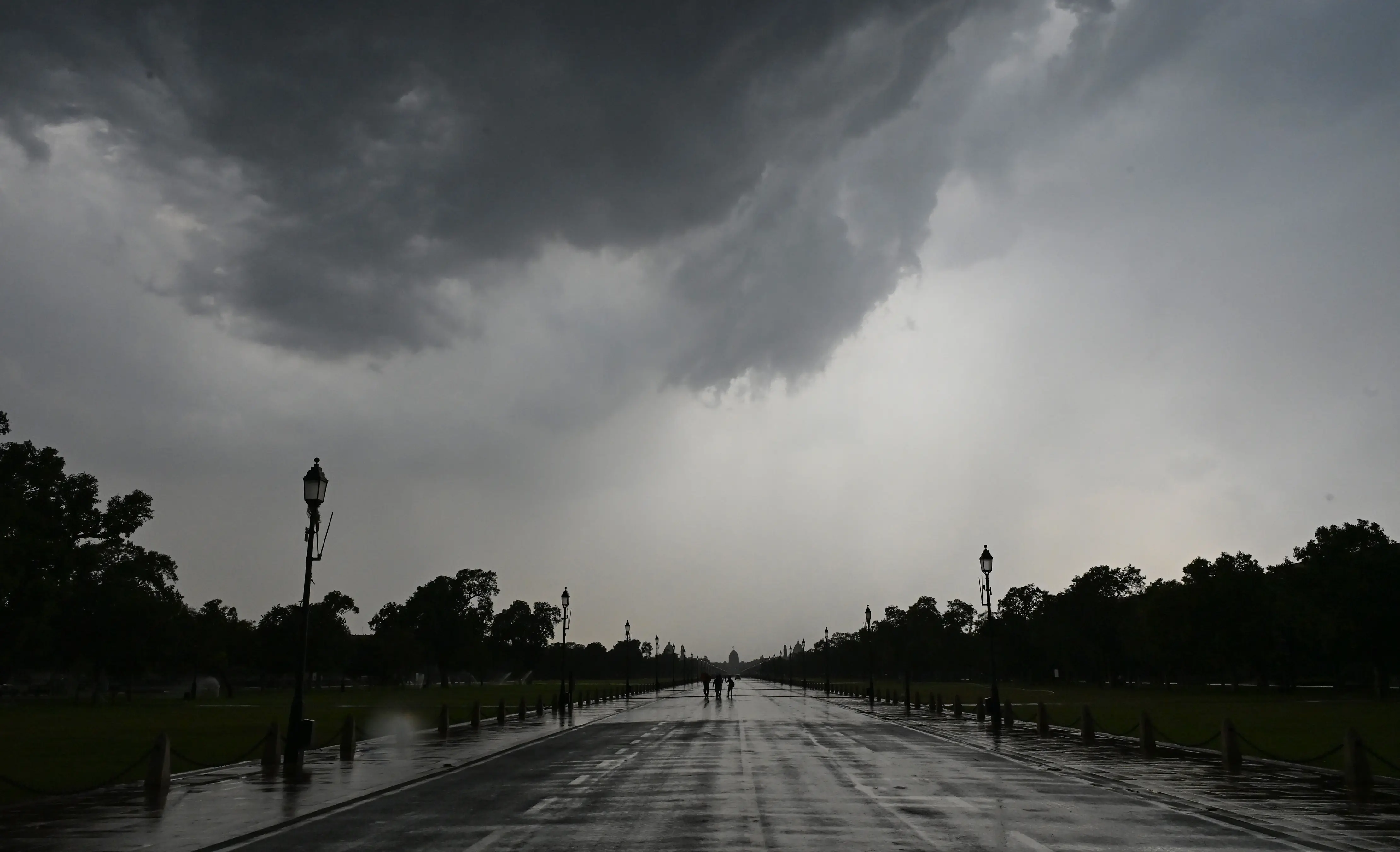 Delhi wakes up to heavy rain bringing respite from heat; IMD issues red alert