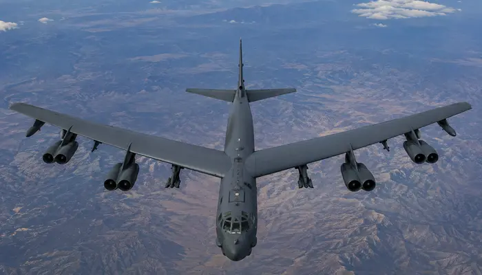 Why are the B-52 bomber's wings so long and flexible?