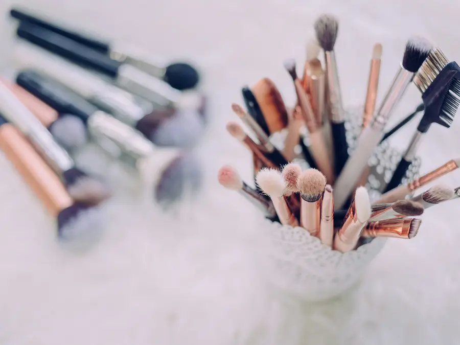 Why should you clean your makeup brushes regularly?