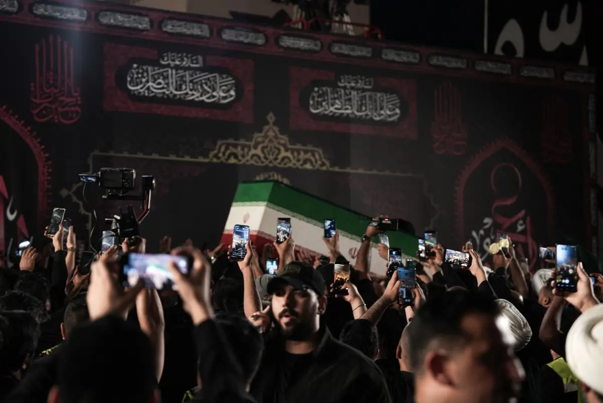 The procession crosses into neighboring Iraq