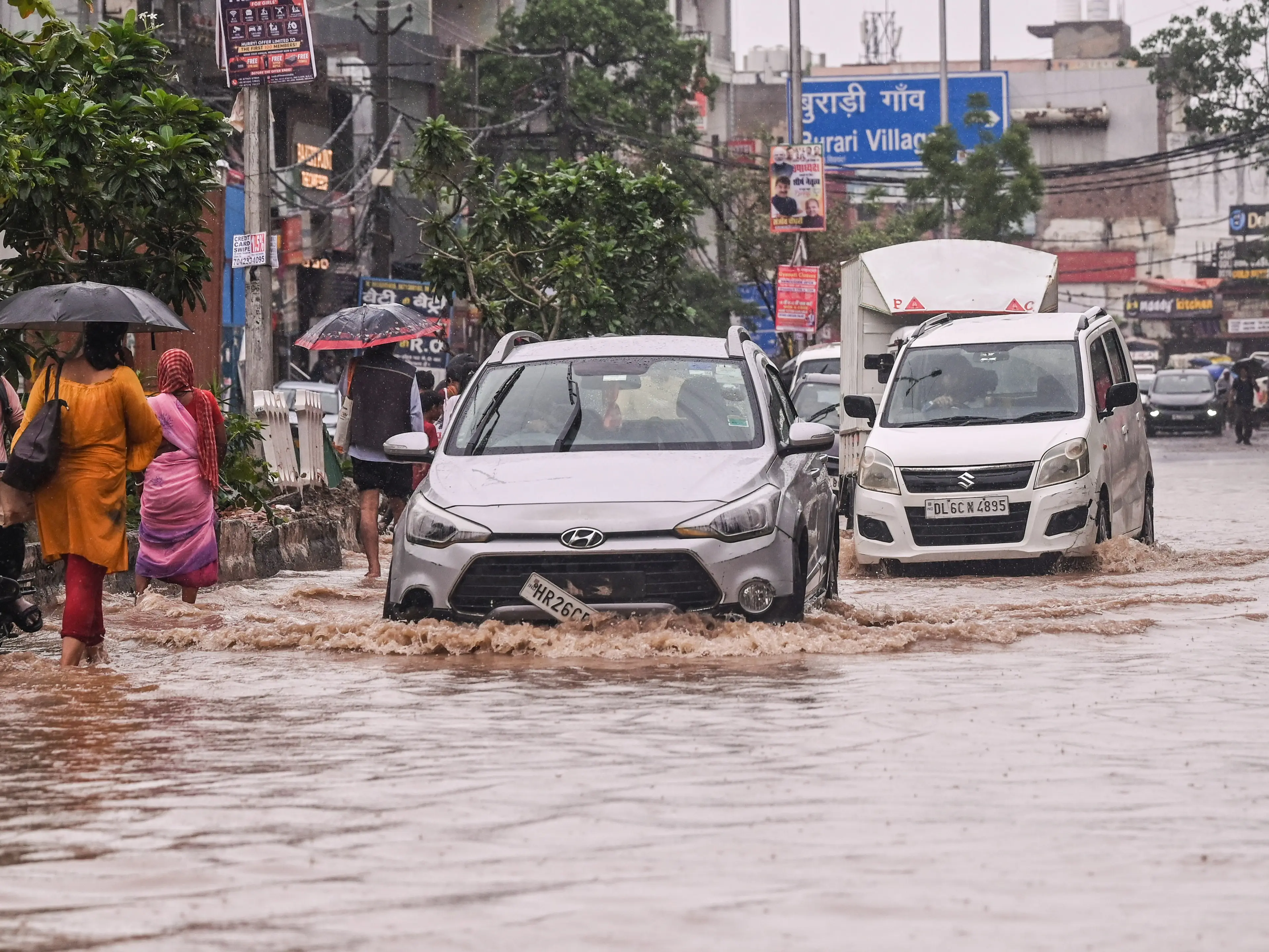 Delhi NCR rains: Heavy downpour floods roads, cripples traffic across region Delhi NCR rains: Heavy downpour floods roads, cripples traffic across region