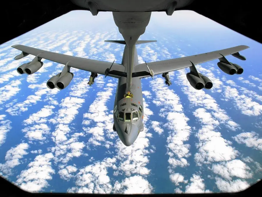 How does the B-52 bomber carry massive payloads over long distances?