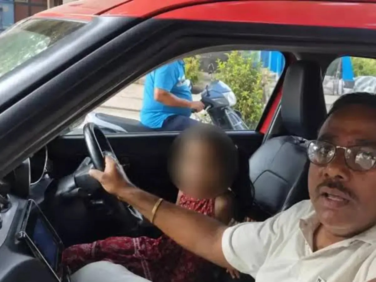 'For Guinness World Record...': Hyderabad cop booked for letting 6-year-old granddaughter drive car - VIDEO 'For Guinness World Record...': Hyderabad cop booked for letting 6-year-old granddaughter drive car - VIDEO