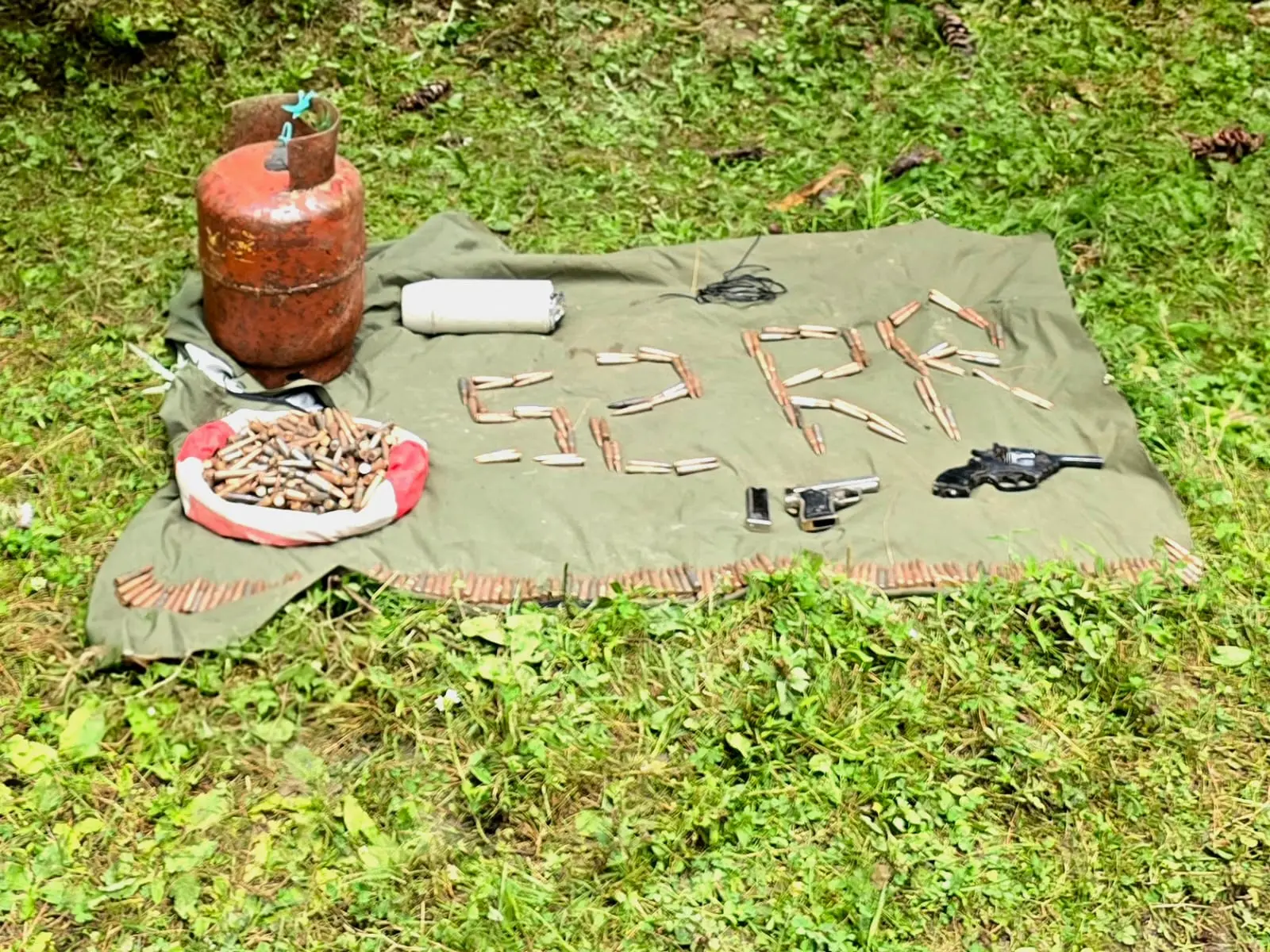Arms, explosives recovered during search operation in Baramulla Arms, explosives recovered during search operation in Baramulla