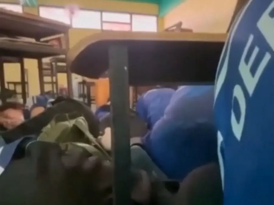 Chilling video shows students take cover as teen opens fire at Thai school