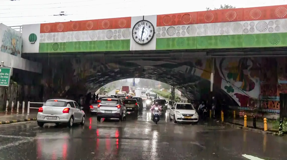 Delhi rains: IMD issues Red alert as heavy showers trigger waterlogging, traffic chaos and flight disruptions