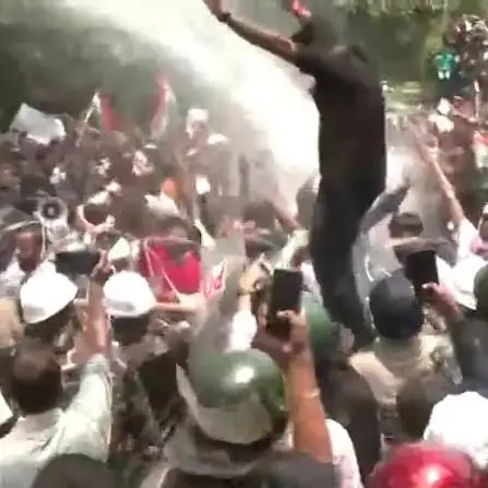 Jharkhand protesters try to remove barricades, dance as police use water cannons during Vidhan Sabha march | WATCH
