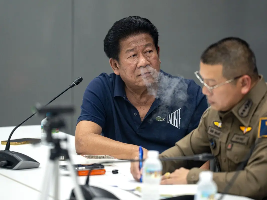 Former Thai MP arrested after shooting local political leader inside government office Former Thai MP arrested after shooting local political leader inside government office