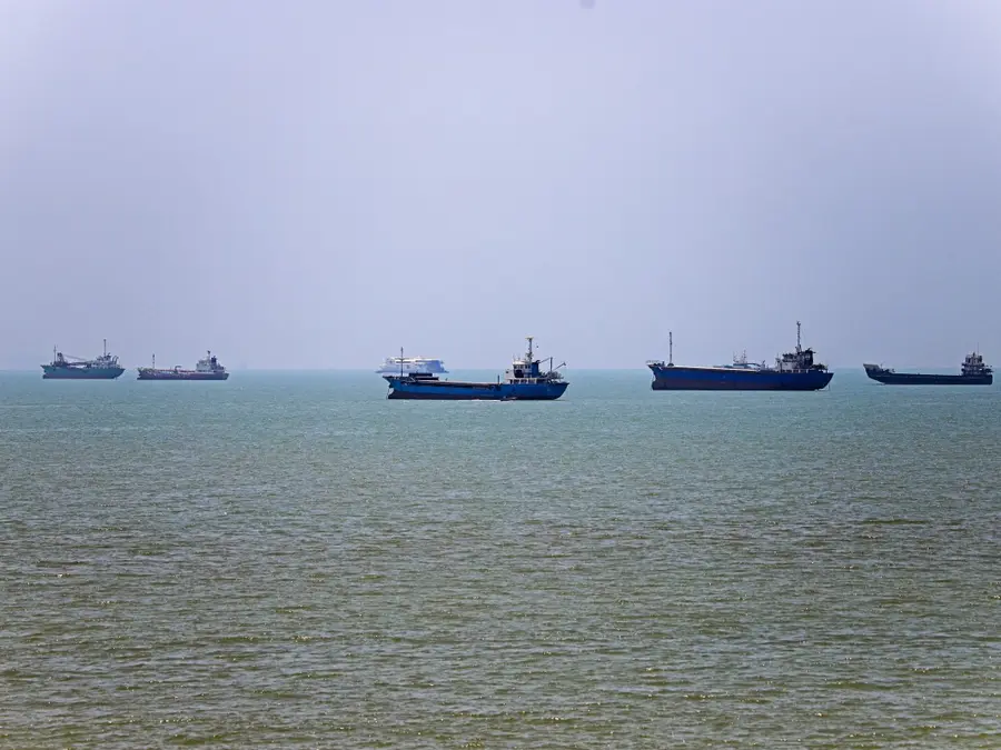 Iran says Hormuz passage deal reached with Oman, reopening tied to US lifting blockade