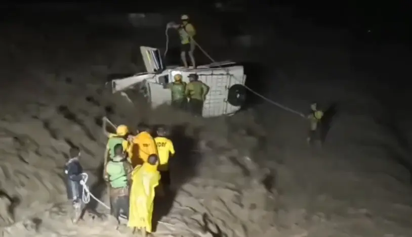 SDRF ‘angels’ brave swollen Bein River to save 2 trapped in overturned car - WATCH