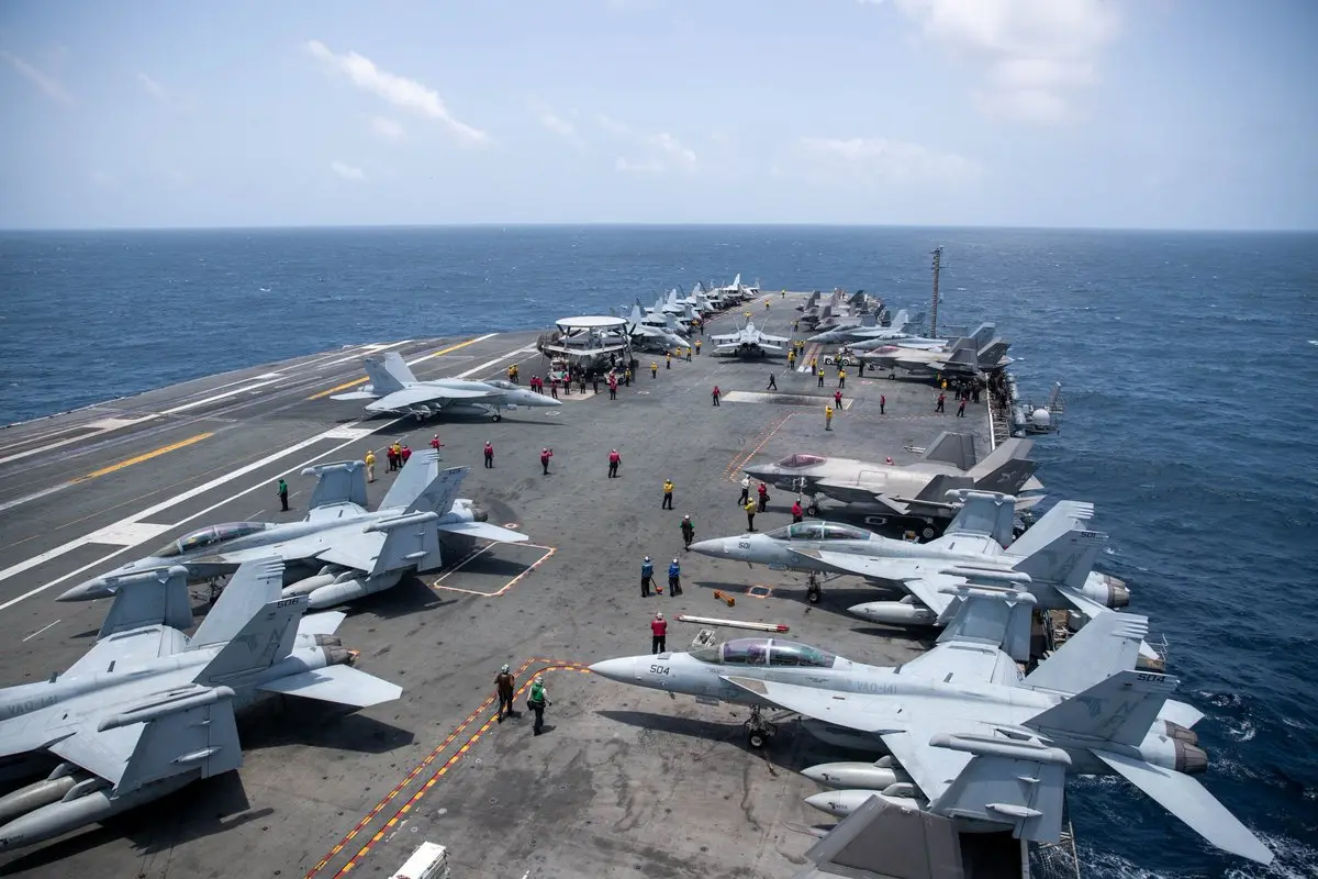 USS George Washington begins operations in Arabian Sea, replacing Abraham Lincoln after more than 250 days