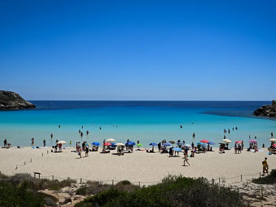 ‘Sexist’ or historic? Italy’s 123-year-old beach sees visitors surge after ‘men here, women there’ controversy